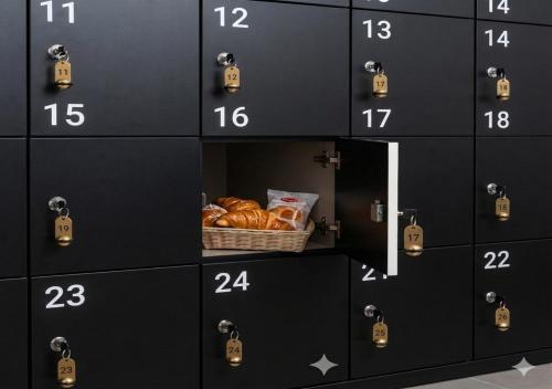 a stack of lockers with bread in a basket at Hotel Rivamare Room only and free coffee room in Cervia