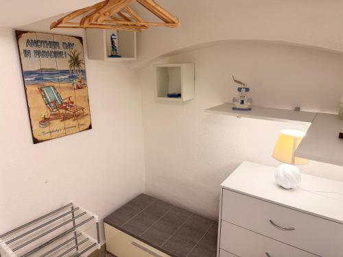 a room with a desk and a chair on the wall at Perla Del Borgo in Gallipoli
