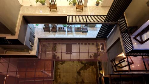 an overhead view of a building with tables and chairs at Ella, Nine Arch Holiday Resort in Ella