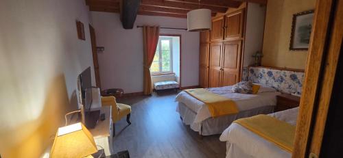 Gulta vai gultas numurā naktsmītnē Le Relais de la Comté
