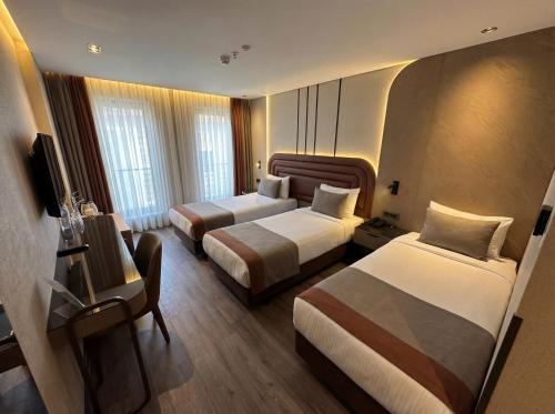 Deluxe Triple Room