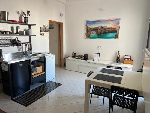 Foto Suite San Benedetto, Terrazza vista mare 4