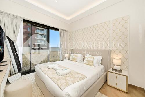 Grandeur 2BR in Azizi Riviera 67