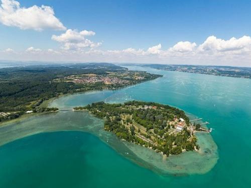 an island in the middle of a large body of water at Ferienhaus Jäger in Friedrichshafen