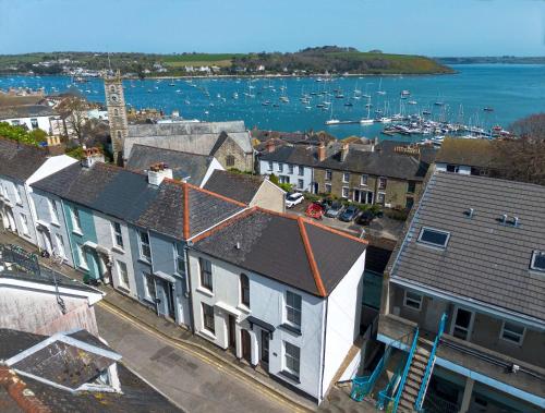 an aerial view of a town with houses and a harbor at 21 Gyllyng Street in Falmouth