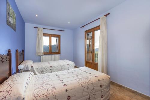a bedroom with a bed and a window at Milano in Campo