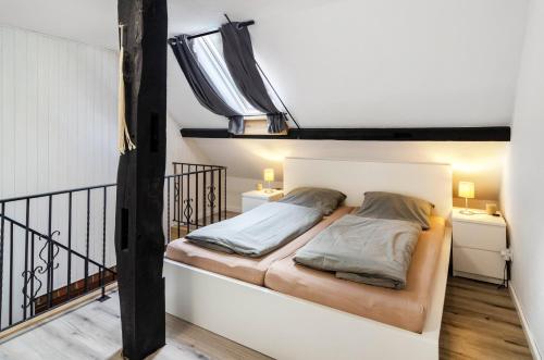 a bedroom with a bunk bed in a room at Ferienwohnung Didi in Detern