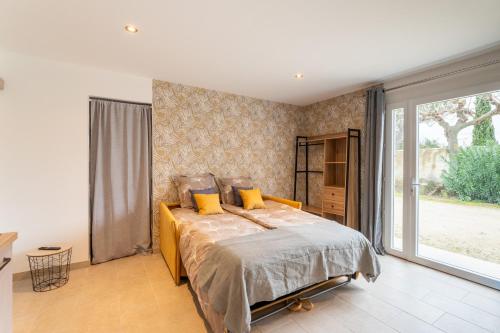 Llit o llits en una habitació de Studio Marquet