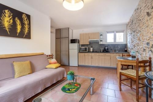 Kuhinja ili čajna kuhinja u objektu Joli Appartement à Claira