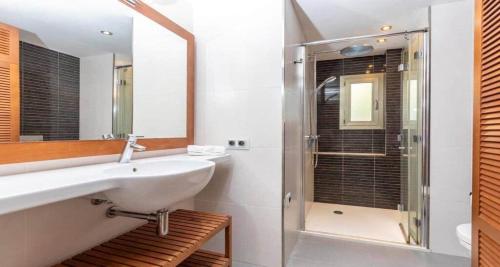 a bathroom with a sink and a shower at Francisca in Pollença