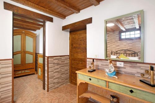 a bathroom with a sink and a mirror at los diablitos 2b - Ideal familias in San Juan de la Rambla
