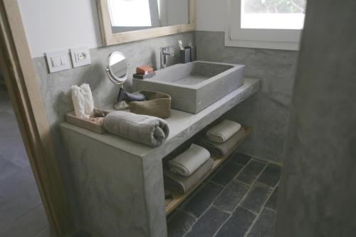 A bathroom at Amani Home - Moja Private Beach Suite