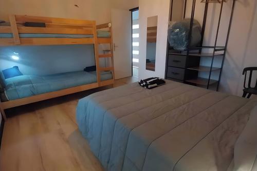 Llit o llits en una habitació de Tric'horn