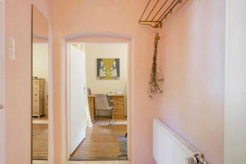 a hallway with an open door to a room at Altes Polchower Pfarrhaus in Alt Polchow
