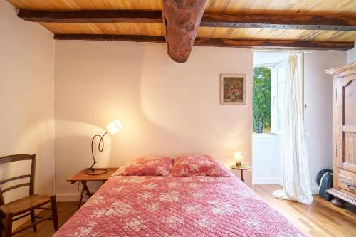 Llit o llits en una habitació de Maison de Ferme