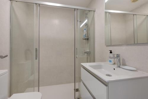 a bathroom with a shower and a sink at Casa Golf in Son Parc