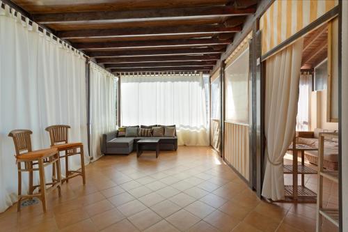a living room with a couch and a table at Villa Private Pool Los Cristianos in Los Cristianos