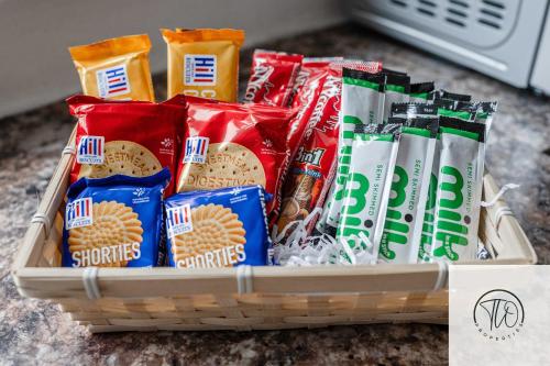 a basket filled with chips and other snacks at Shamrock House in Ipswich
