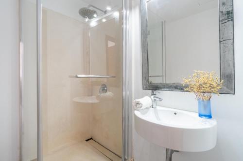 a bathroom with a sink and a mirror at Miramar in Artá