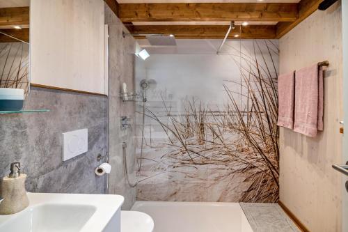 a bathroom with a shower and a sink at Vroni in Ebersbach-Musbach