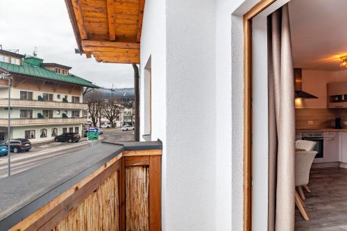 a balcony with a view of a street at Appartement by Blahut Vacation - og in Ehrwald