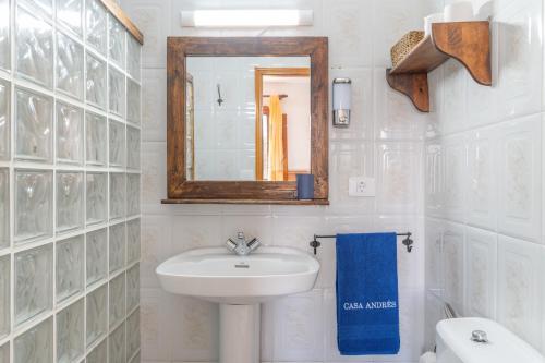 a bathroom with a sink and a mirror at Andres House, Tías in Tías