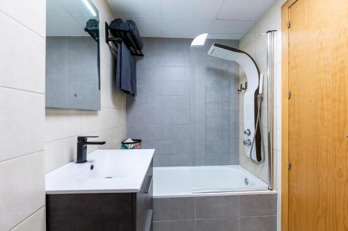 a bathroom with a sink and a shower at Sofie apartamento turístico in Roquetas de Mar