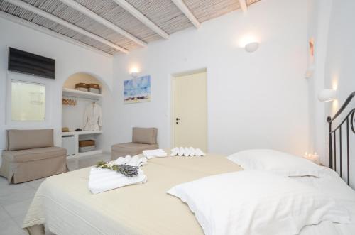 Postel nebo postele na pokoji v ubytování Galini Hotel