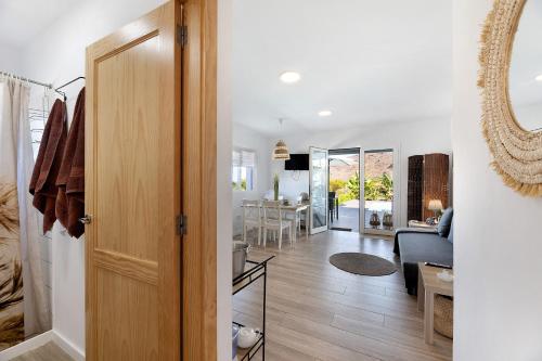 a room with a door leading to a living room at Villa Tino- Casa M in Los Llanos de Aridane