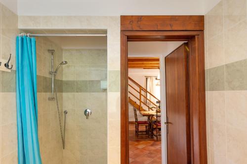 a bathroom with a shower and a walk in shower at Il Nazareno - Civetta in Cecina