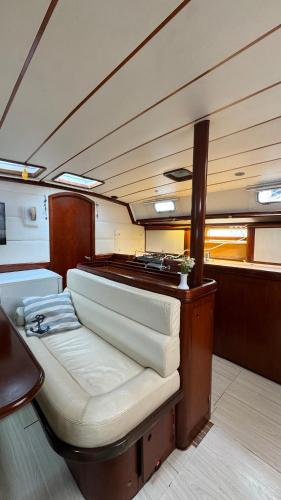 a boat with a bed in the middle of a room at Каюта in Kotor