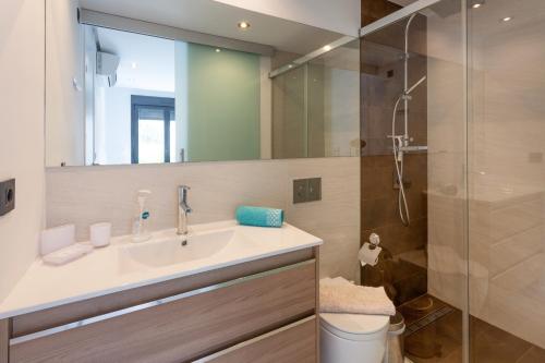 a bathroom with a sink and a shower at Apartment in Mil Palmeras in Pilar de la Horadada