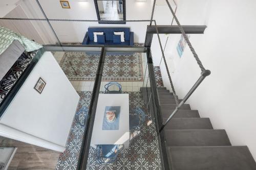 an overhead view of stairs in a house at Le Suite del Castello in Castellammare di Stabia
