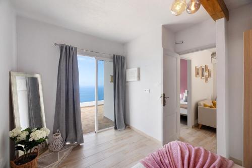 a living room with a view of the ocean at Casa Valista in Tijarafe