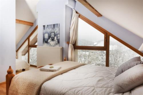 Postel nebo postele na pokoji v ubytování Chalet l'Orée du Bois