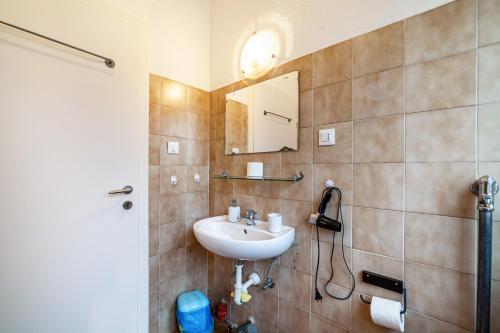 a bathroom with a sink and a mirror at Residence Hubertus Ap 1 - Meran in Merano