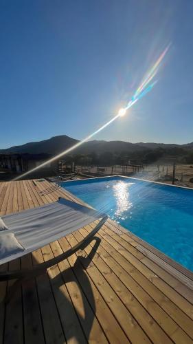 Bazén v ubytování Les Chalets De Tesa 2 nebo v jeho okolí