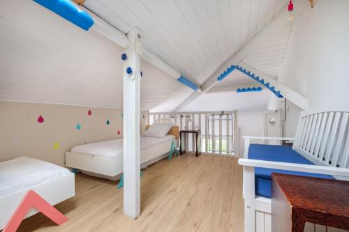 a kids room with two beds and a desk at Maison avec studio Cros de Cagnes in Cagnes-sur-Mer
