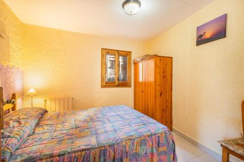 Llit o llits en una habitació de El Case