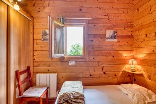 Llit o llits en una habitació de Chalet Rapiette