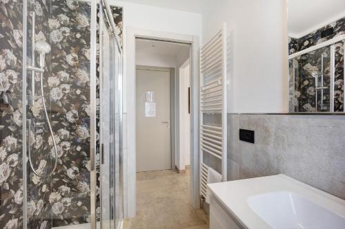 a bathroom with a shower and a sink at Antichi Ricordi - Il Sole in Marina di Andora