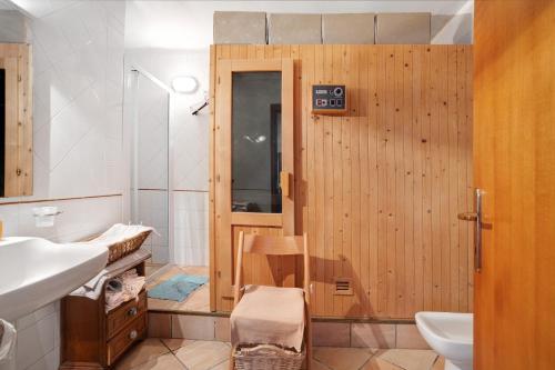 a bathroom with a shower and a sink at La Torre in Arcola
