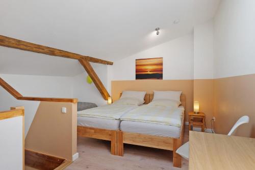 a bedroom with a bed in a room at Ferienwohnung Junge 1 in Lohe-Rickelshof