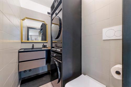 a bathroom with a sink and a mirror at Lake Como Style Home in Lecco