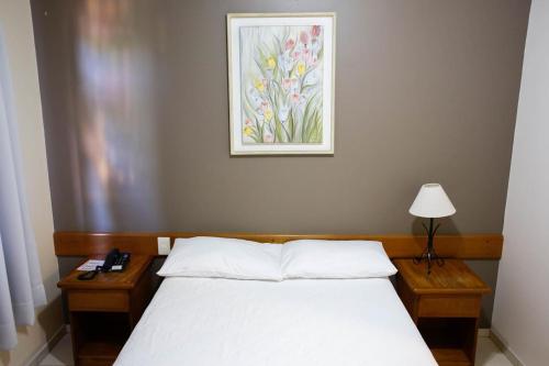 Ένα ή περισσότερα κρεβάτια σε δωμάτιο στο Hotel Abib