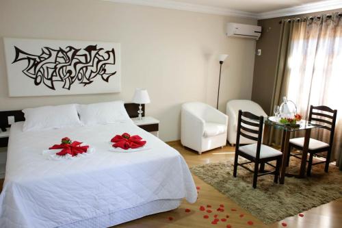 Postel nebo postele na pokoji v ubytování Hotel Abib