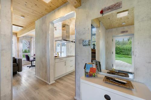 a kitchen and dining room of a house at Ferienhäuser Stickel in Freudenstadt