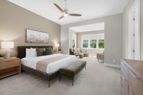 a bedroom with a large bed and a living room at Paddle Pointe in Sherrills Ford