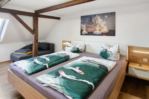a bedroom with two beds in a room at Am Graben in Hasselfelde