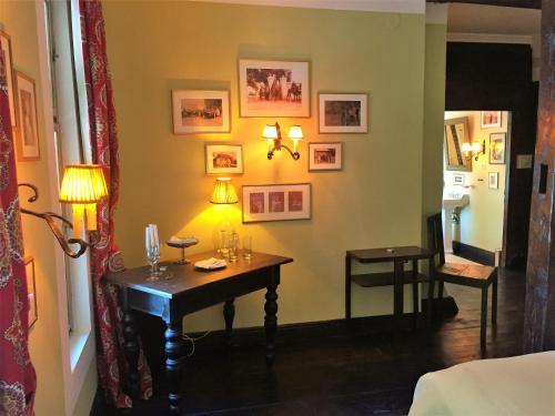 a room with a desk and a room with a hallway at Zabola Estate - Transylvania in Zăbala